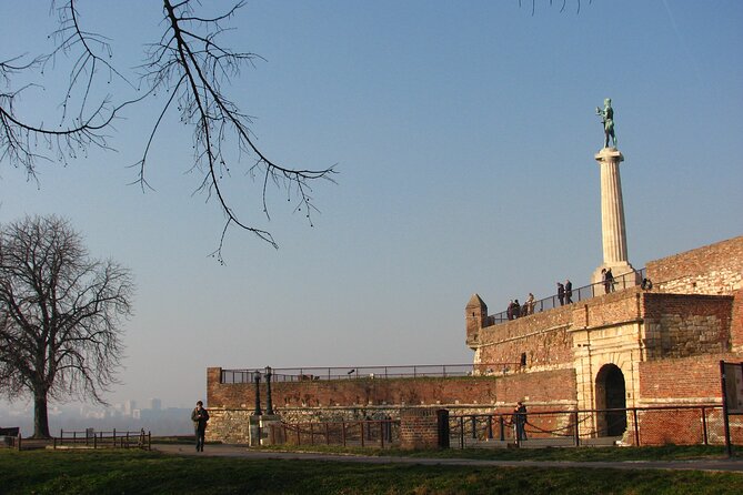 Belgrade Private Layover Tour With Return Airport Transfers - New Belgrade and the Genex Towers drive-by
