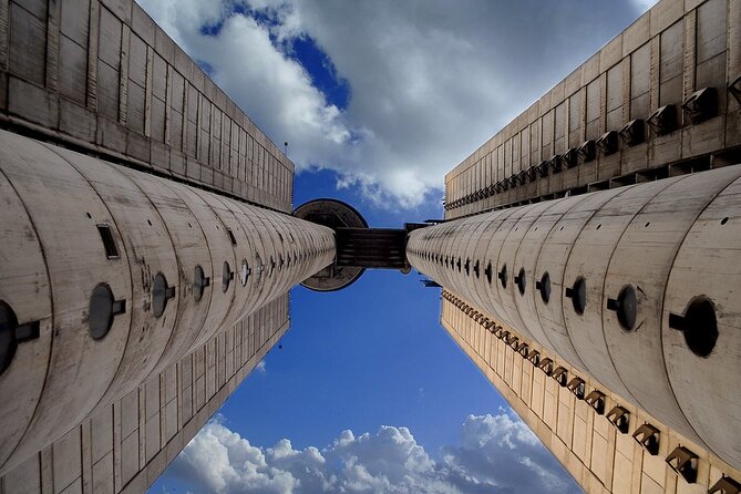 E-Scooter Communist Yugoslavia Tour - Stop 1: Genex Tower and Yugoslav brutalism in motion