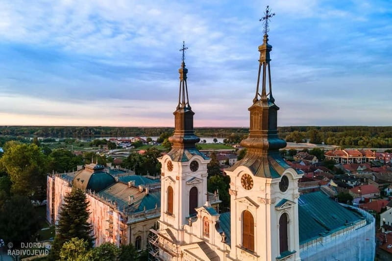 From Novi Sad: Sremski Karlovci and Krusedol Monastery Tour - Sremski Karlovci main square walk: fountains, gymnasium, and St. Nicholas Church